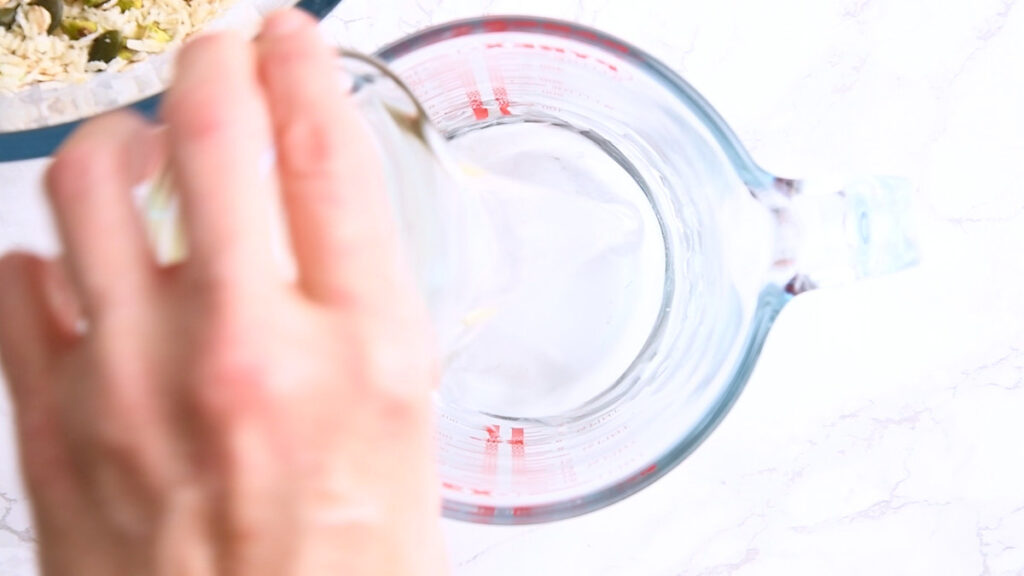 Add melted coconut oil to a jug